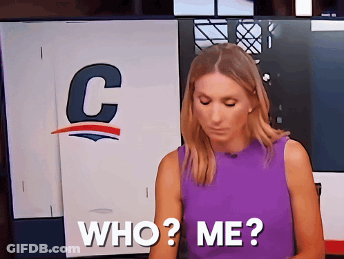 Woman In Purple Shirt Saying Who Me GIF