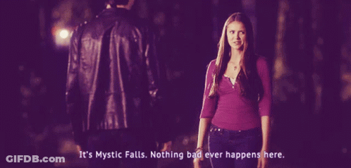 Woman In Purple Shirt Says It's Mystic Next To Man In Black Jacket GIF
