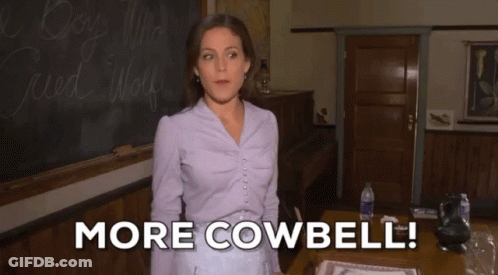 Woman In Purple Shirt Says More Cowbell GIF
