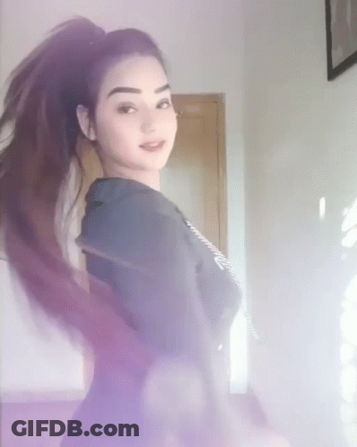 Woman In Purple Shirt Standing GIF