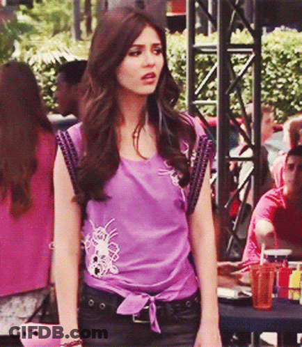 Woman In Purple Shirt Standing GIF