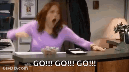 Woman In Purple Shirt Yelling With Arms Outstretched GIF