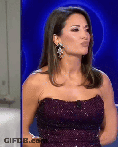 Woman In Purple Strapless Dress And Star Earrings GIF