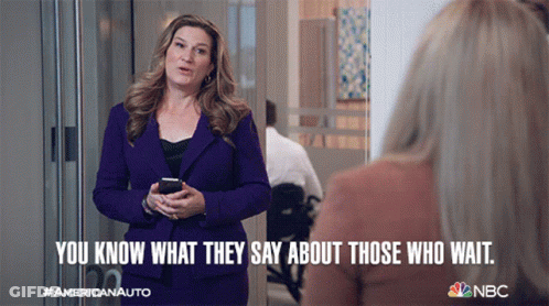 Woman In Purple Suit Saying You Know What They Say GIF