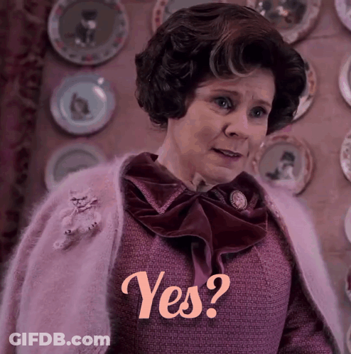 Woman In Purple Sweater Asking Yes GIF