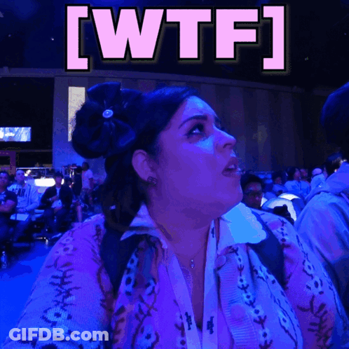 Woman In Purple Sweater Looking Up At WTF GIF