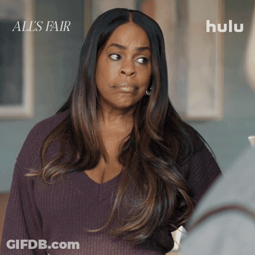 Woman In Purple Sweater Saying All's Fair GIF