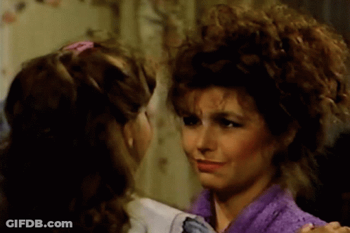 Woman In Purple Sweater Stirring Soup GIF