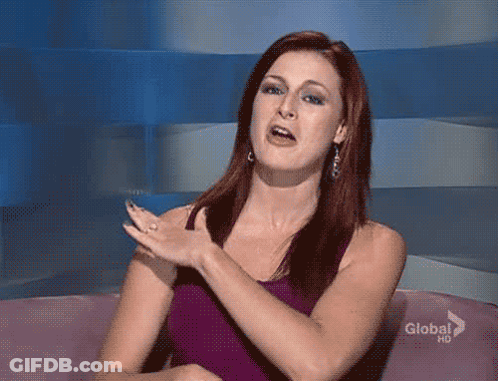 Woman In Purple Tank Top On Pink Couch GIF