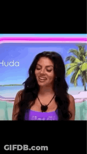 Woman In Purple Tank Top Smiling GIF
