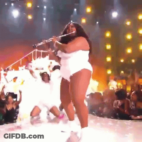 Woman In Purple Top And Shorts GIF