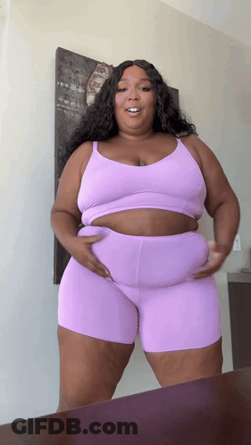 Woman In Purple Top And Shorts GIF