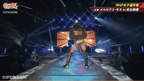 Woman In Purple Wrestling Outfit Shaking Hands With Man In Truck GIF