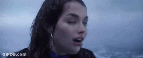 Woman In Rain Eyes Closed Wet Hair GIF