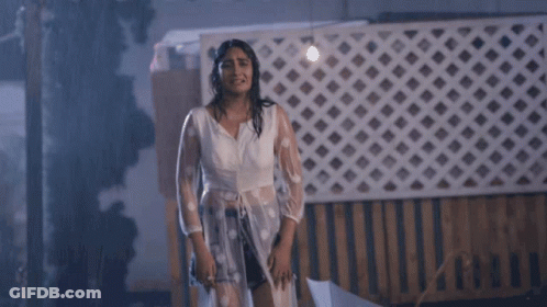 Woman In Rain With Umbrella And Neha Sign GIF