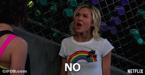Woman In Rainbow T-Shirt Saying No GIF