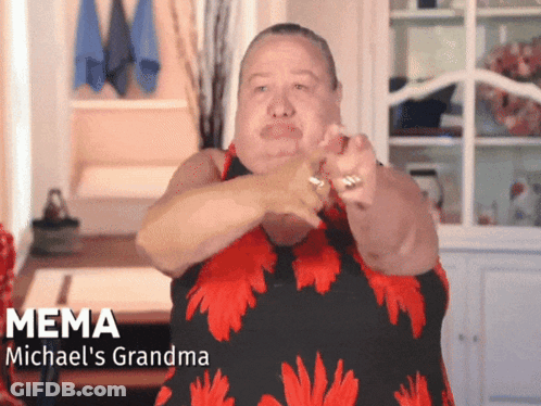 Woman In Red And Black Dress Named Mema GIF