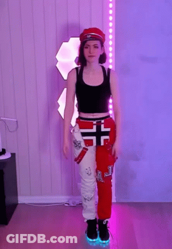 Woman In Red And White Pants Saying AJ GIF