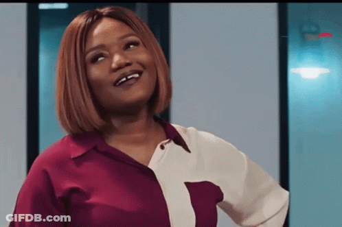 Woman In Red And White Shirt Smiling Up GIF