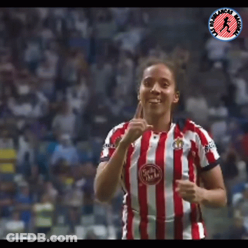 Woman In Red And White Striped Shirt Giving Thumbs Up GIF
