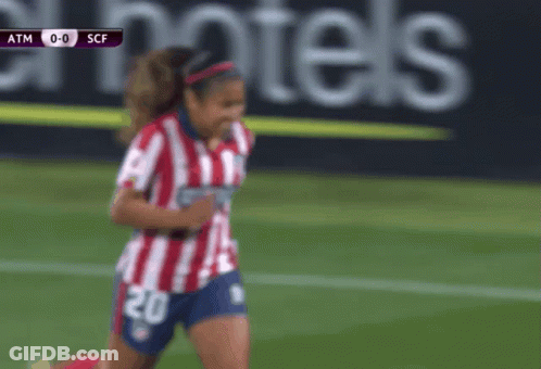 Woman In Red And White Striped Shirt Number 20 GIF