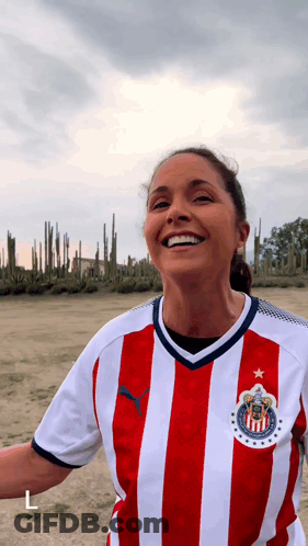 Woman In Red And White Striped Shirt With Star GIF