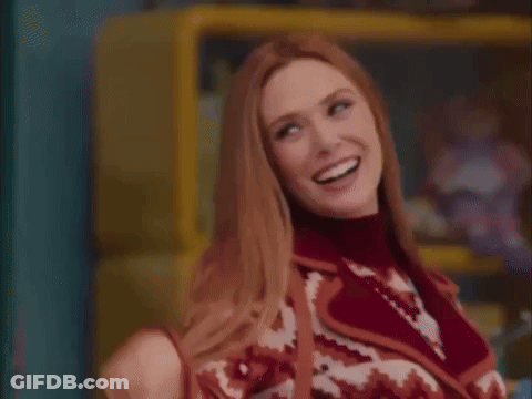 Woman In Red And White Sweater Smiling GIF