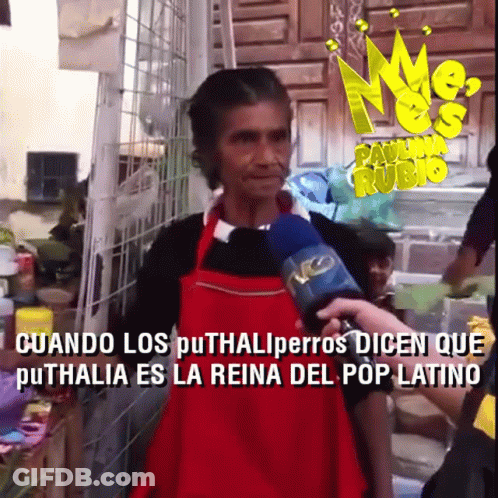 Woman In Red Apron Interviewed With Microphone GIF