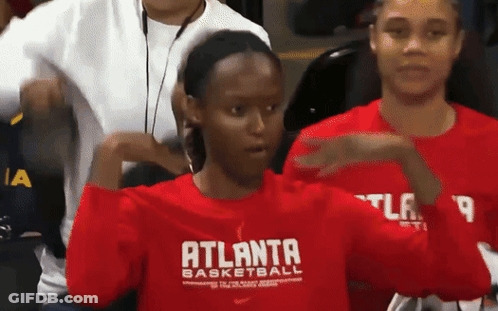 Woman In Red Atlanta Basketball Sweatshirt GIF