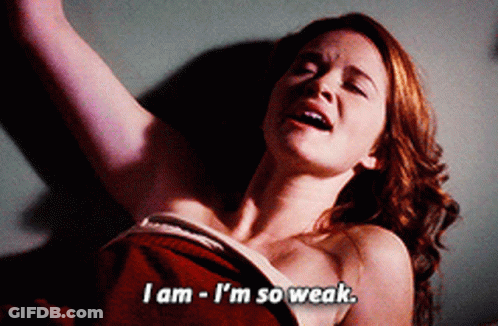 Woman In Red Blanket Saying I'm So Weak GIF