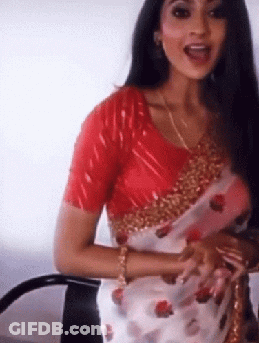 Woman In Red Blouse And White Saree GIF