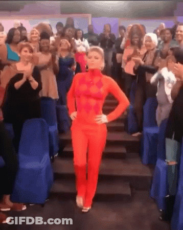 Woman In Red Bodysuit Dancing GIF