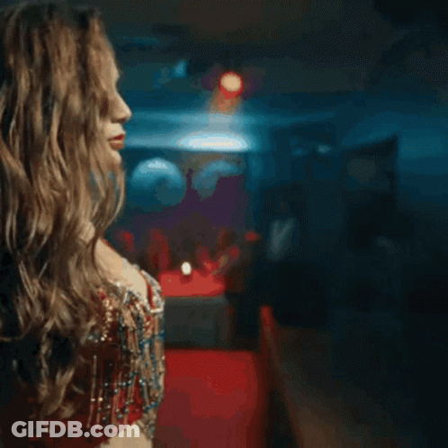 Woman In Red Bra Dancing With Arms Outstretched GIF