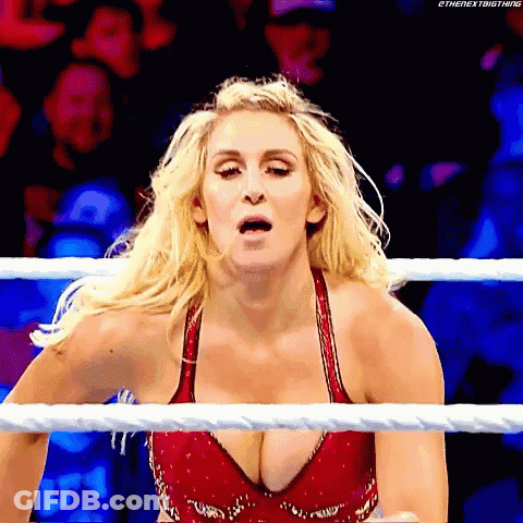 Woman In Red Bra Standing In Wrestling Ring GIF