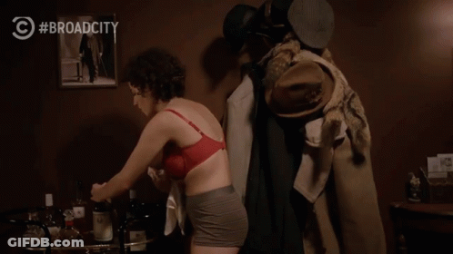 Woman In Red Bra Touched By Man In Trench Coat #BroadCity GIF