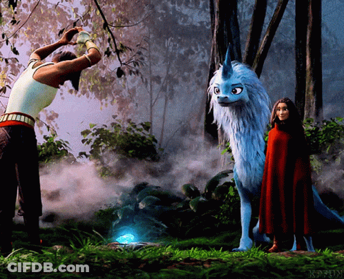 Woman In Red Cape Next To Blue And White Animal GIF