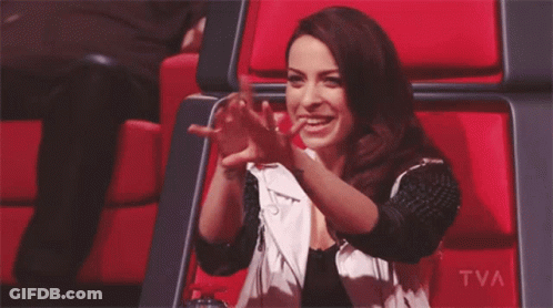 Woman In Red Chair With TVA GIF