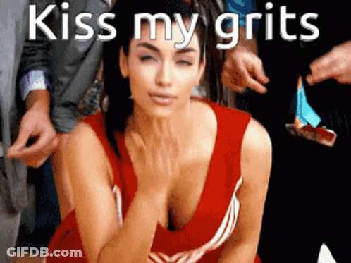 Woman In Red Cheerleading Uniform Kissed By Man GIF