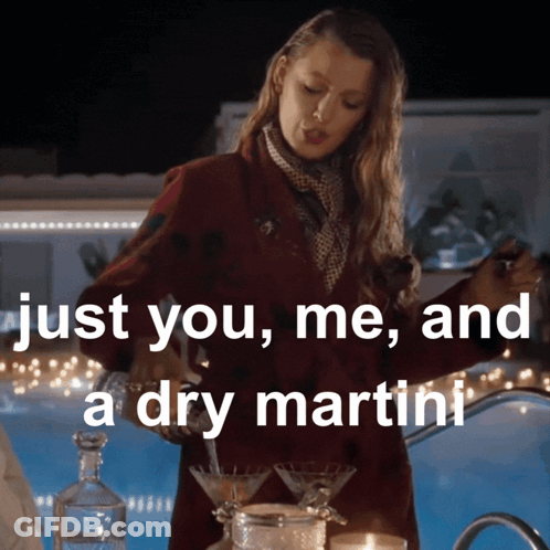 Woman In Red Coat Pouring Martini GIF