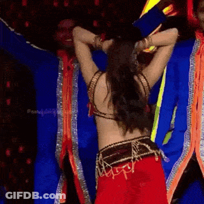 Woman In Red Costume Dancing On Stage GIF