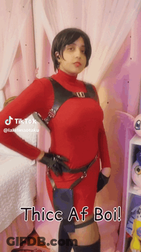 Woman In Red Costume In Front Of Pink Curtain Thice Af Boi GIF