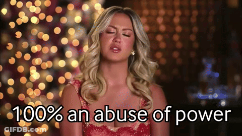 Woman In Red Dress 100% An Abuse Of Power GIF