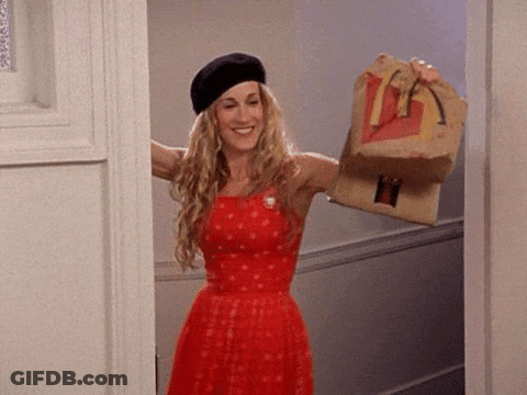 Woman In Red Dress And Black Beret Holding McDonald's Bag GIF