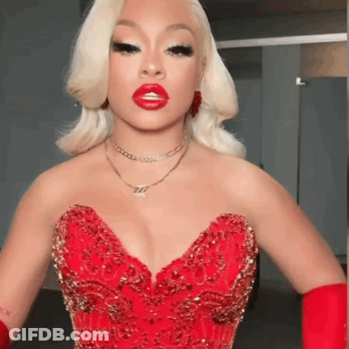 Woman In Red Dress And Gloves GIF