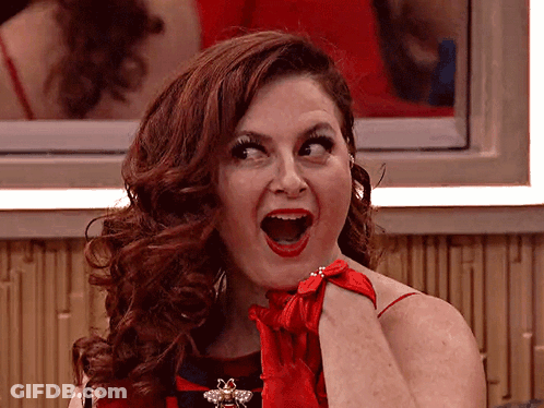 Woman In Red Dress And Red Gloves Mouth Open GIF