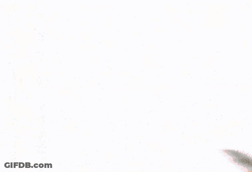 Woman In Red Dress And Santa Hat Walking GIF