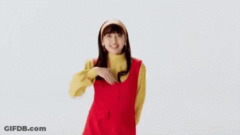 Woman In Red Dress And Yellow Sweater Giving Thumbs Up GIF