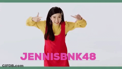 Woman In Red Dress And Yellow Sweater Holding Scissors GIF