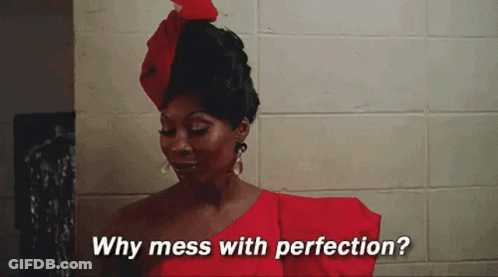 Woman In Red Dress Asking Why Mess With Perfection GIF