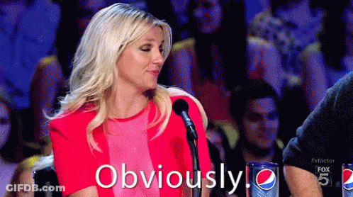 Woman In Red Dress At Microphone Says Obviously GIF